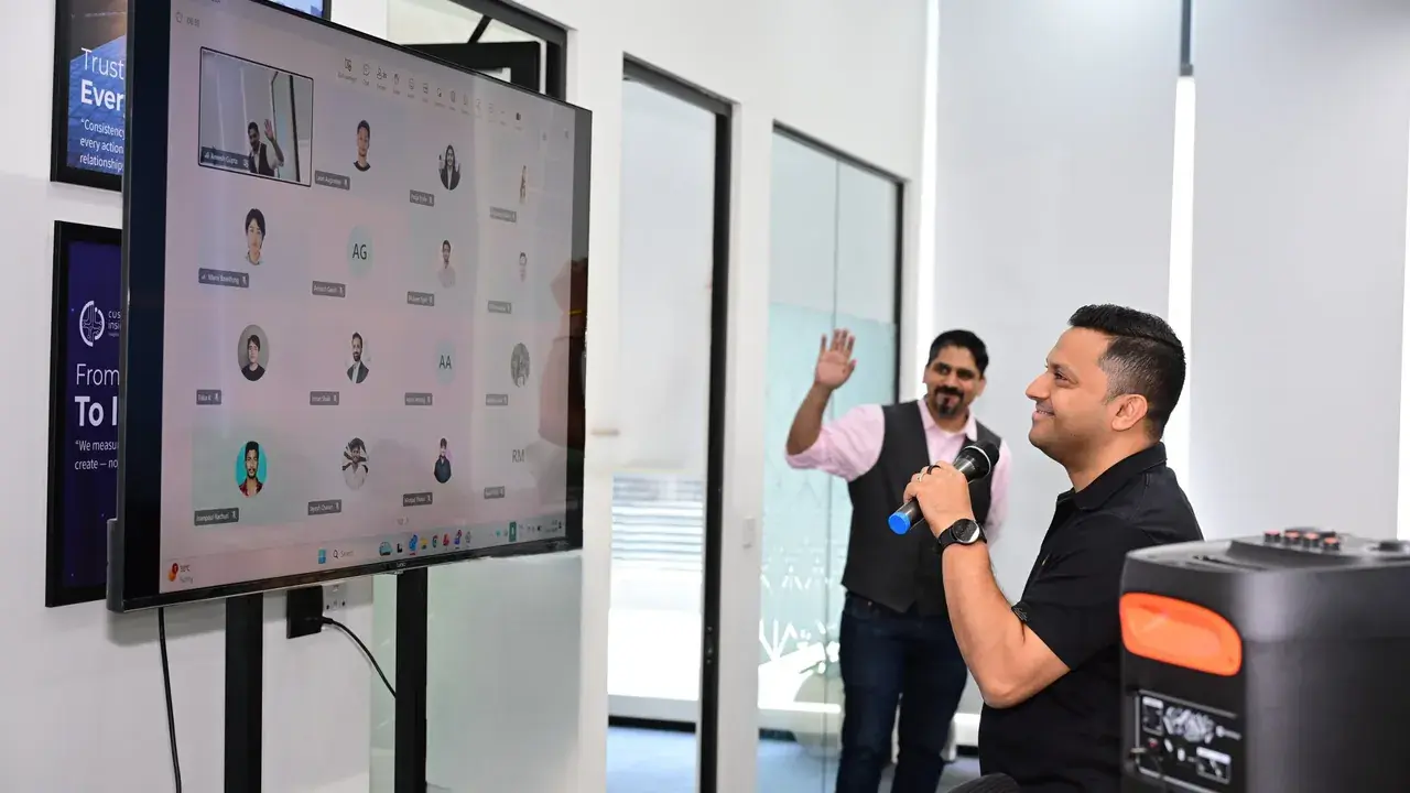 CustomerInsights.AI team members collaborating